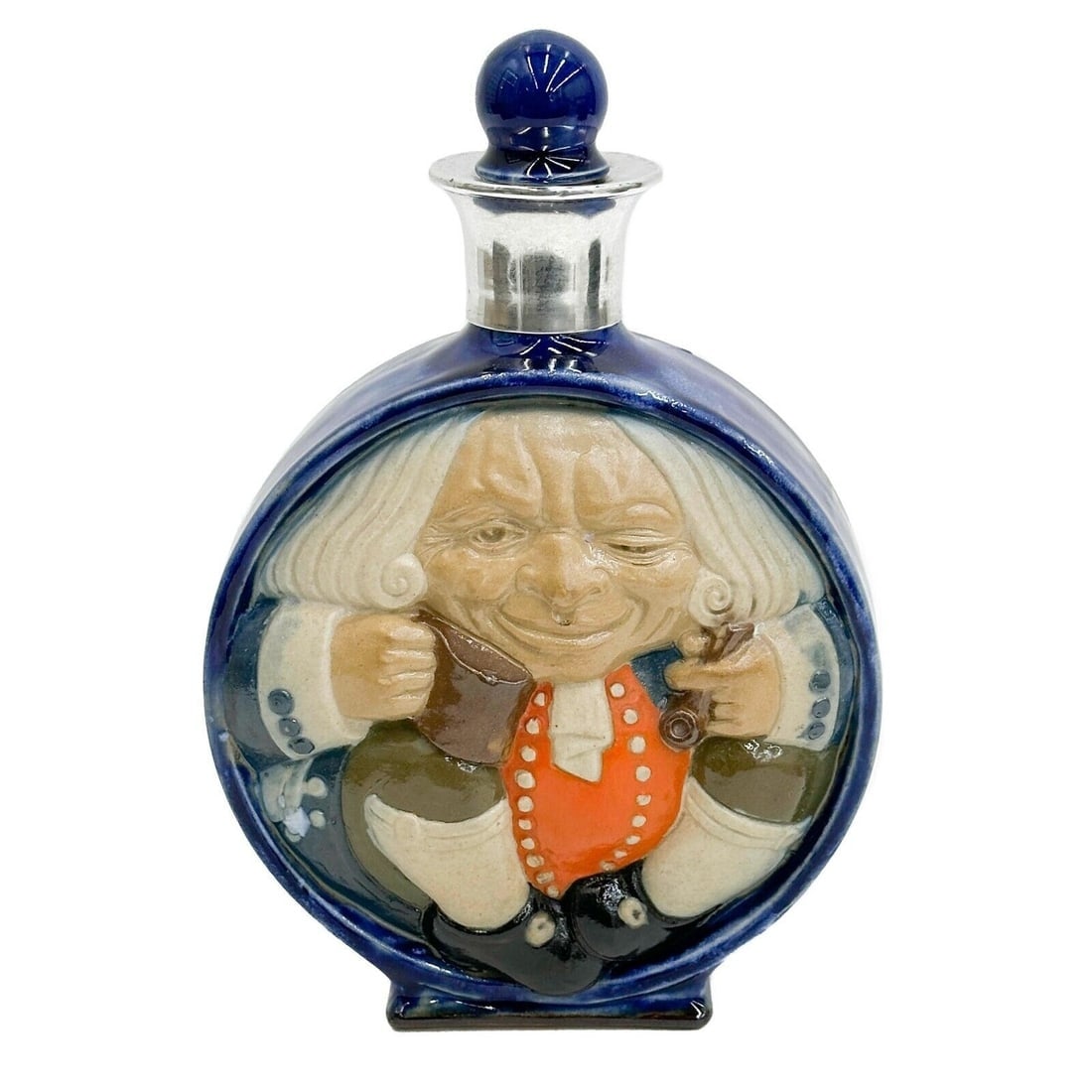 Doulton Lambeth Porcelain Asprey Silver Toby Philpot The Best is Not too Good: Doulton Lambeth Porcelain Asprey Silver Mounted Decanter "The Best is Not too Good". Moonflask decanter with the figure of a man, Toby Philpot, inside. Silver mount marked Asprey London, date marks fo