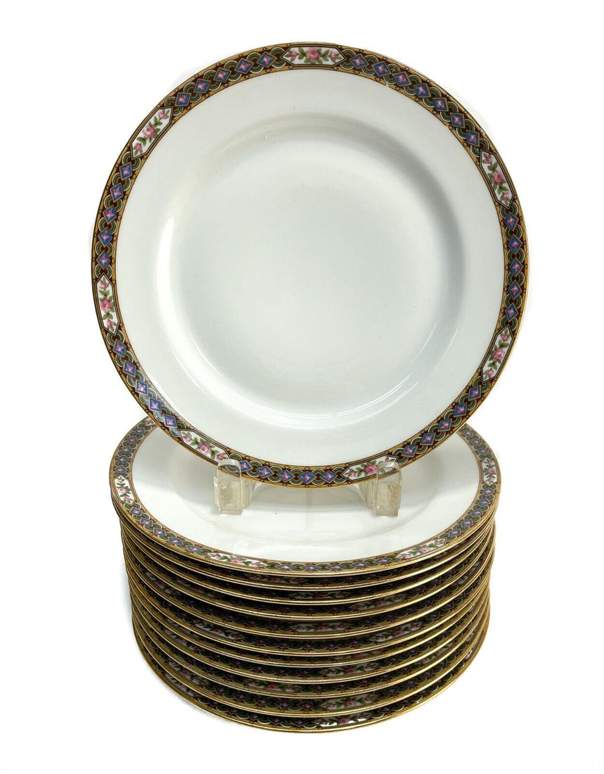 12 Jean Pouyat Limoges France Porcelain 8.825 inch Dessert Plates, circa 1900: 12 Jean Pouyat Limoges France porcelain 8.825 inch dessert plates, circa 1900. Floral designs with geometric shapes to the rim. Marked Jean Pouyat Limoges to the underside. Weight: Approx. 5 lbs Measu