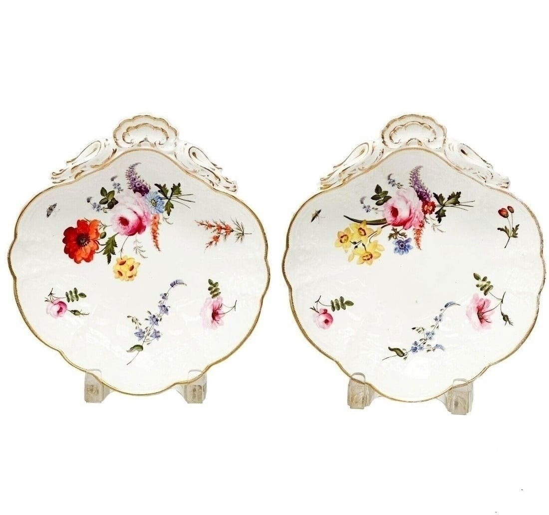 Pair English Hand Painted Porcelain Fan Shape Dishes Florals 19th cen: Pair English Hand Painted Porcelain Fan Shape Dishes, 19th century. A white ground with raised foliate decoration. Hand painted florals to the center, gilt to the scalloped edge. Unknown incised under