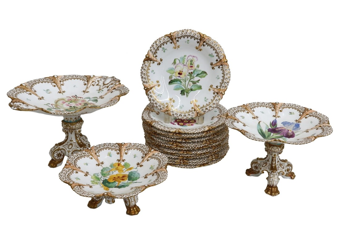 Continental Hand Painted Flora Danica Style Dessert Service for 14 circa 1900: Continental hand painted Flora Danica style dessert service for 14, circa 1900. Various hand painted flowers to center with gilt accents to the scallop rims. The service includes 14 dessert plates, on