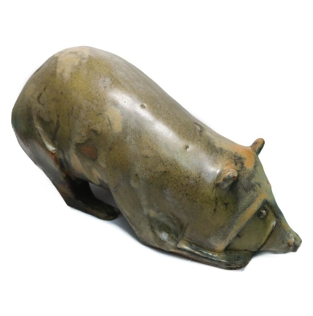 Loet Vanderveeen Ceramic Pottery of a Racoon, Signed: Loet Vanderveen Ceramic Racoon Sculpture. Matte and high polish glazed pottery in grey and brown. Signed Loet to the underbelly. Weight Approx., 20 lbs Measures Approx., 22 incehs x 18 inches x 8 inch