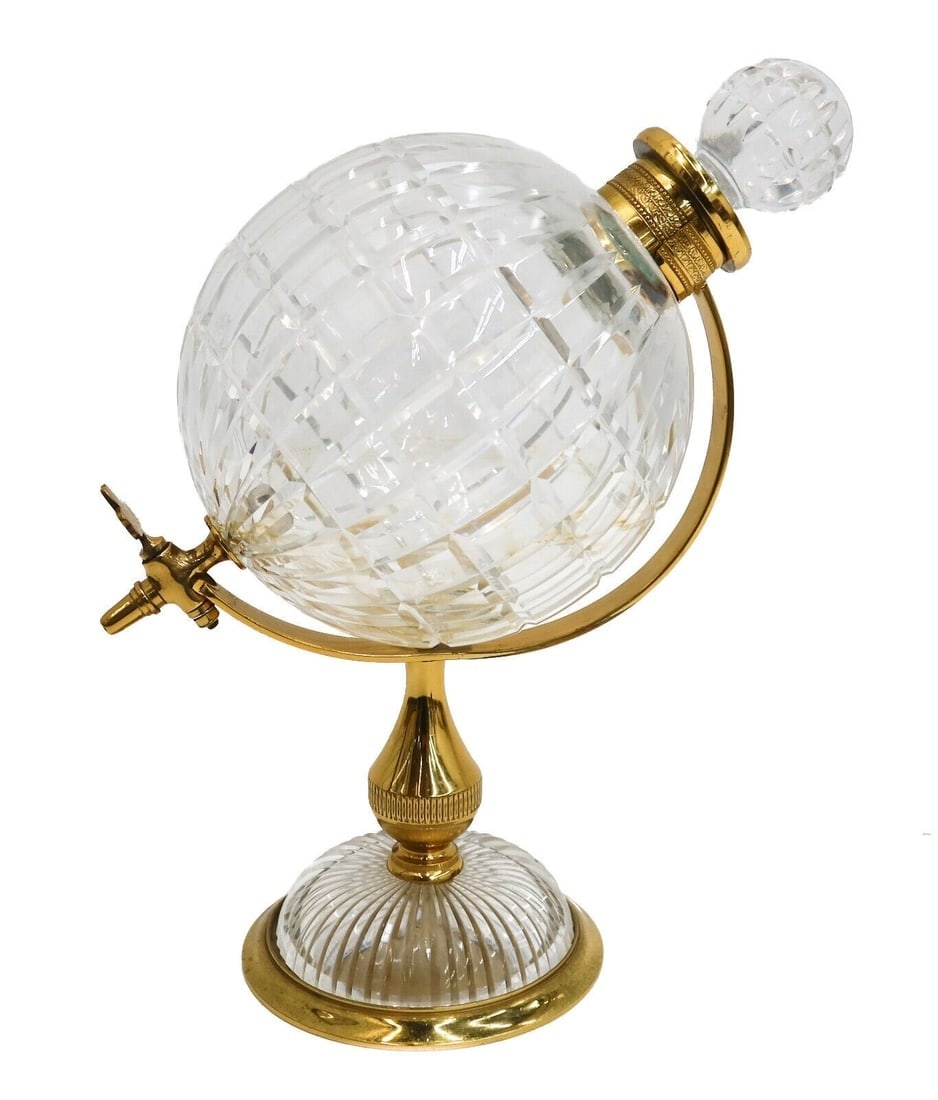 Vintage Gilt Metal and Cut Glass Globe Form Decanter: Vintage Gilt Metal and Cut Glass Globe Form Decanter. Cut glass rectangles to exterior of bowl with stopper and cut sunburst base. Weight: Approx. 3 lbs Measurements: Approx.10 inches x 6 inches x 11.