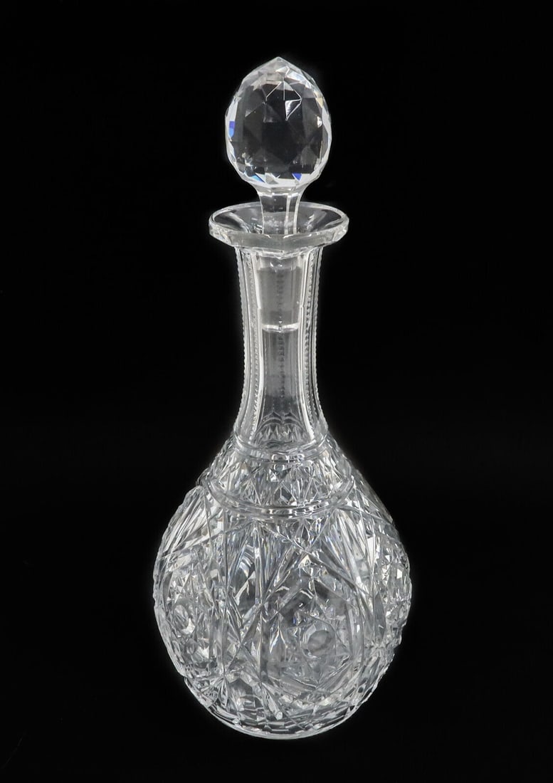 Baccarat France Cut Crystal Glass Decanter in Lagny, Signed: Baccarat France cut crystal glass decanter in Lagny, Signed. Elaborate cut star designs to exterior. Acid etched Baccarat mark to base. Weight: Approx. 4 lbs Measurements: Approx. 5.25 inches diameter