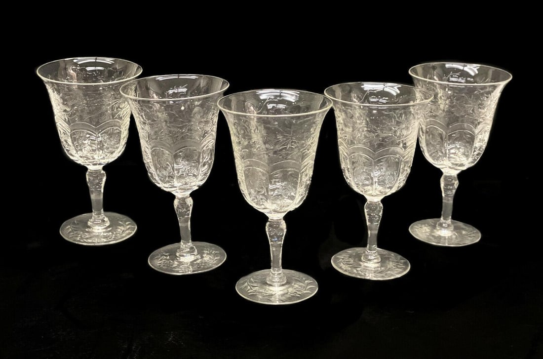 5 Continental Cut Glass Emulating Rock Crystal Wine Goblets, circa 1960: 5 Continental cut glass emulating rock crystal wine goblets, circa 1960. Intricate cut flowers throughout the exterior and to the base. Continental, but likely French. Weight: Approx. 4 lbs Measuremen
