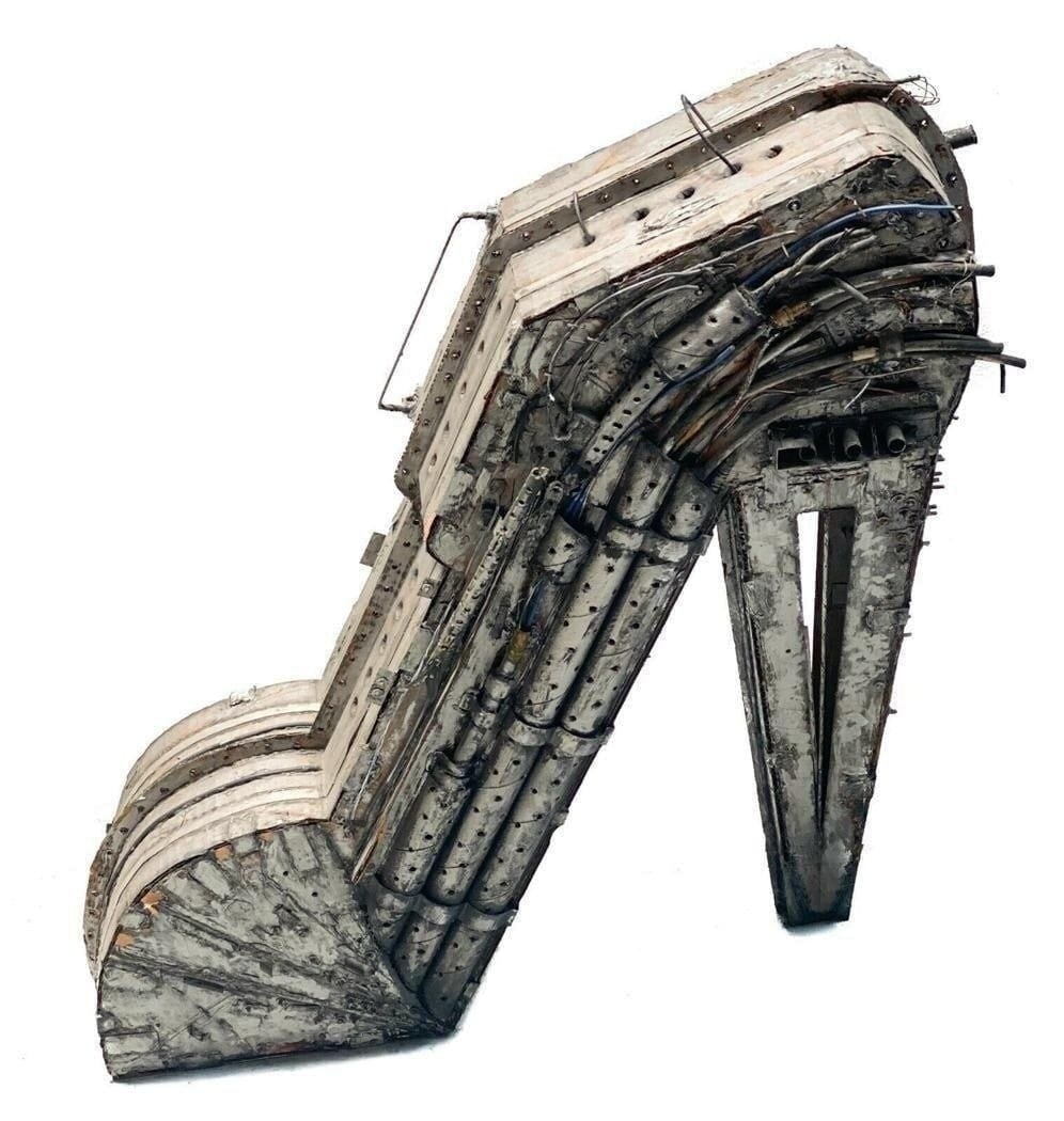 Nick De Angelis (US 20th C) Industrial Paper Mache Cardbord High Heel Sculpture: Nick De Angelis (American 20th Century) industrial, paper mache, and wire high heel sculpture. Artist signed to the underside.Nick de Angelis (June 21, 1921 – 2004) was an American artist who lived