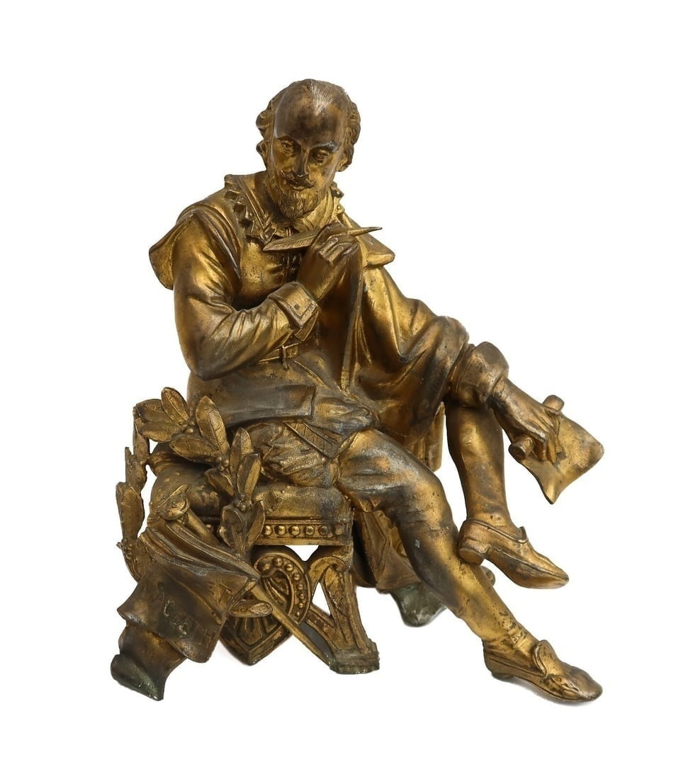 English Gilt Cast Metal Sculpture of William Shakespeare 19th Century: English gilt cast metal sculpture of William Shakespeare 19th Century. The sculpture depicts a seated Shakespeare holding quill and roll of paper. His works including Hamlet and Macbeth to the side of
