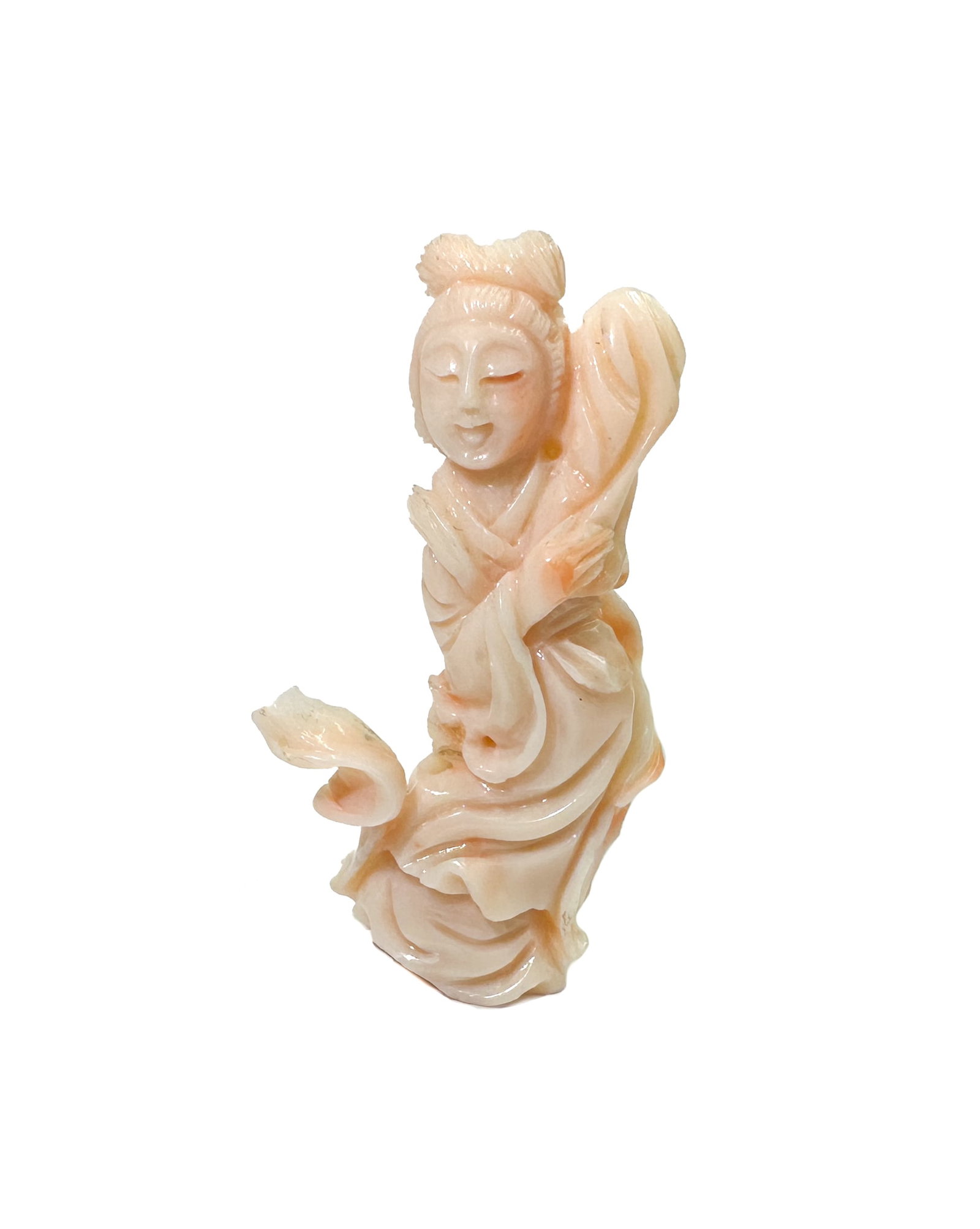Carved Pink Coral Diety Figure of Guan Yin: Carved Pink Coral Diety Figure of Guan Yin. Weight Approx., 24.89 grams Measures Approx., 2.6 inches x 1.325 inches x 0.5 inches tall Domestic Shipping:$25