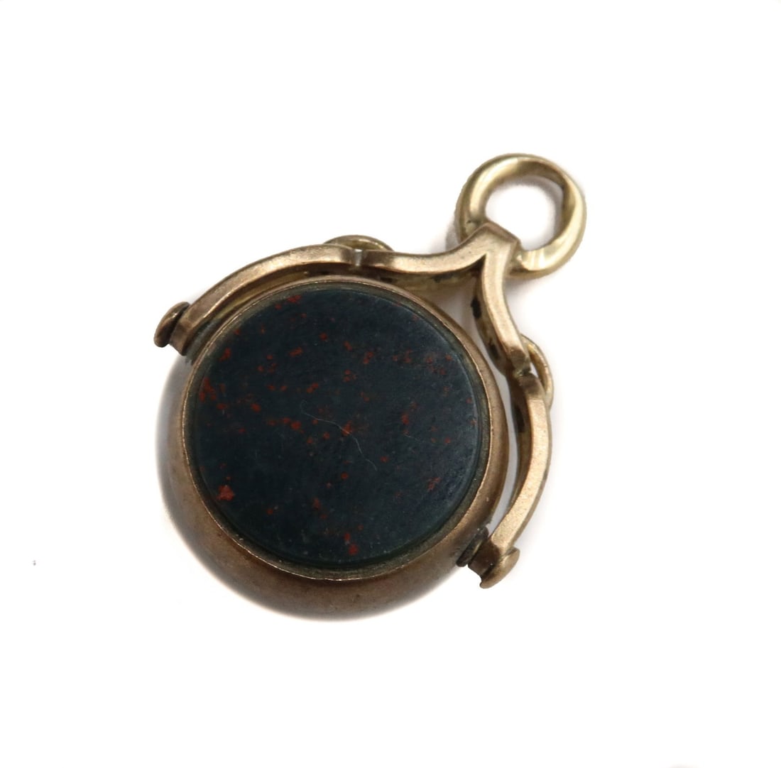 14k Yellow Gold Bloodstone and Quartz Fob Seal: 14k Yellow Gold Bloodstone and Quartz Fob sael, Pendant or Stamp Seal. One side with bloodstone the other with quartz. Indistinguishable hallmark to edge. Tests for 14k gold. Weight Approx., 7.51 gram