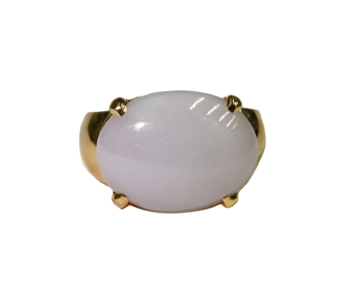 Swiss 18k Yellow Gold and Cabochon White Jade Ring Size 8.5: Swiss 18k Yellow Gold and Cabochon White Jade Ring Size 8.5. Cabochon white jade ring to center measuring approximately 16.2mm x 12.3mm x 6.1mm. Marked 18k Swiss. Weight Approx., 9.79 grams Measures A