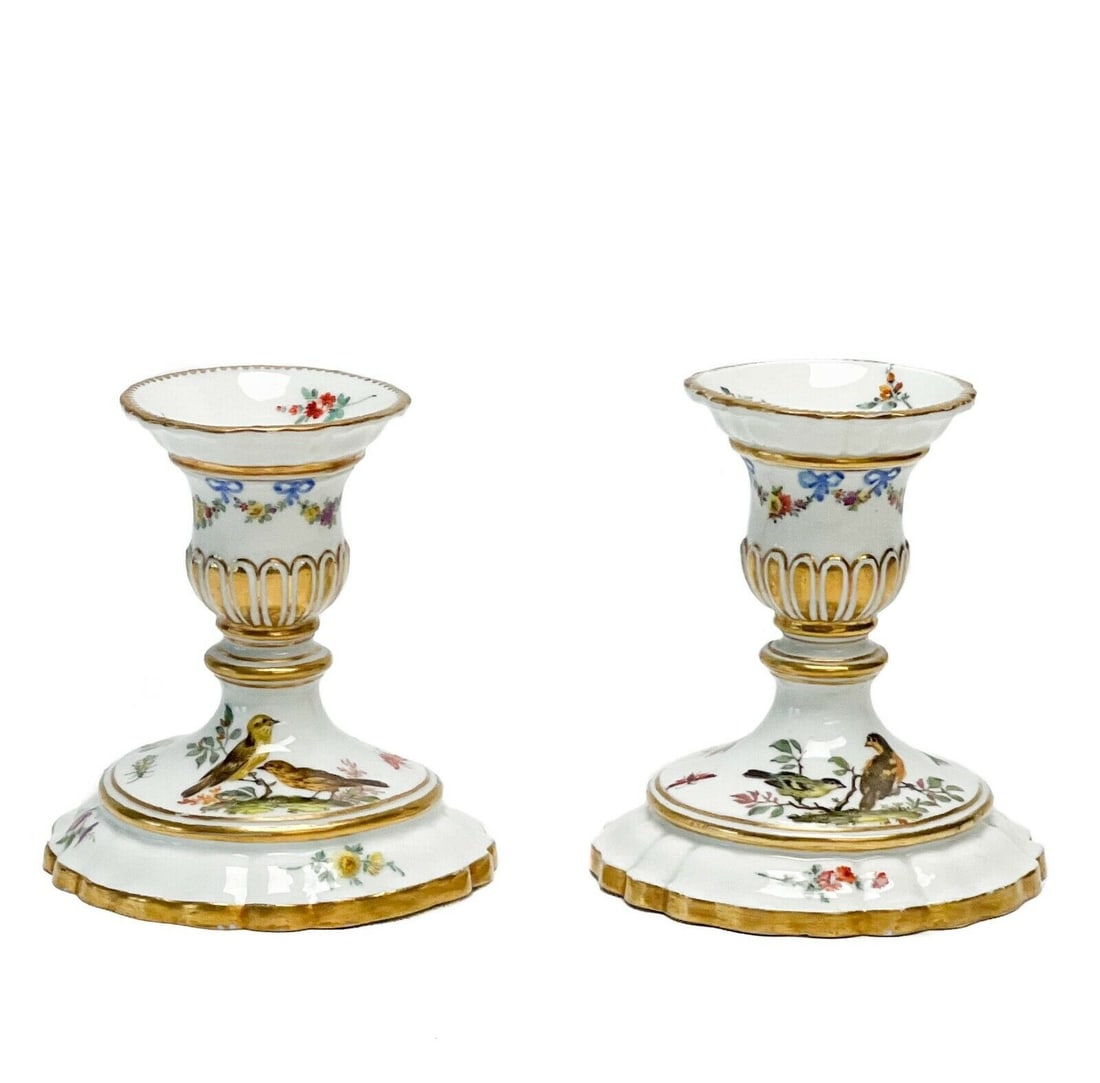 Pair Meissen Marcolini Period Germany Ornithological Porcelain Candlesticks: Pair of Meissen Marcolini Period Germany ornithological hand painted porcelain candlestick holders, circa 1800. A white ground with hand painted birds and flowers throughout, gilt accents. Meissen Mar