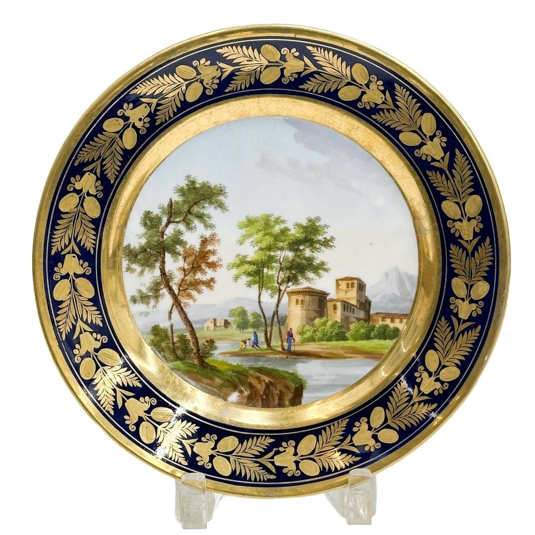 Darte Freres a Paris Hand Painted Porcelain Topographical Cabinet Plate c1810: Darte Freres a Paris Hand Painted Porcelain topographical Cabinet Plate, circa 1810. Depicts a landscape scene of a building with figures to the center. A cobalt blue ground with gilt decoration to th