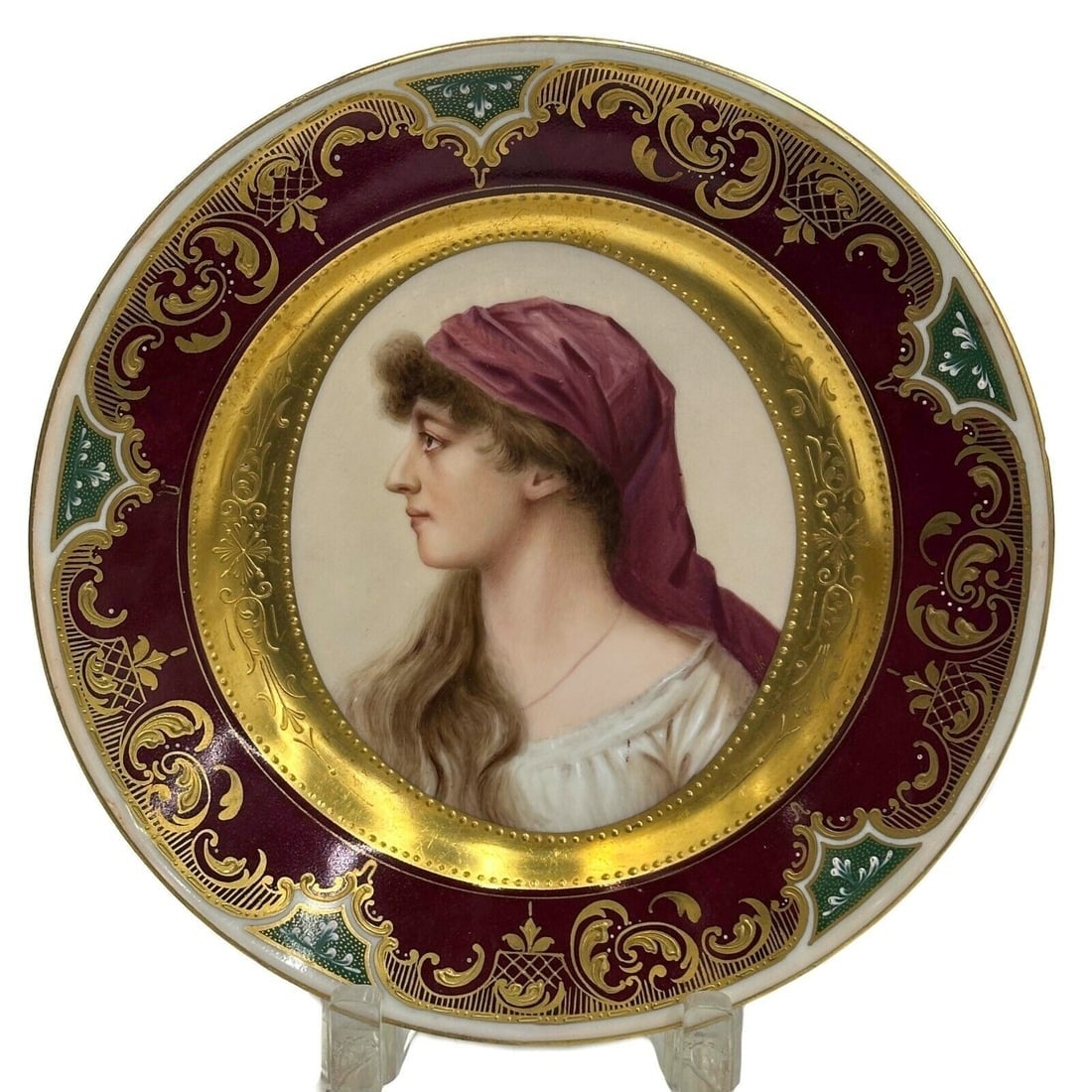 Royal Vienna Austria Hand Painted Porcelain Portrait Plate Klea circa 1920: Royal Vienna Austria Hand Painted Porcelain Portrait Plate. Hand painted portrait of a woman to the center, artist signed to the Kenisek to the lower edge. Underside with Royal Vienna mark, marked "Au
