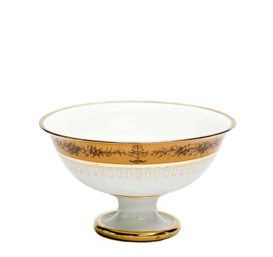 Manufacture de Sevres Gilt Porcelain Fruit Bowl Nankin Yellow 1824-1830: Manufacture de Sevres porcelain fruit bowl, 1824-1830. A white ground to center, a nankin yellow ground to the edge with brown painted roses. Gilt snowflake/flower decoration to the center, gilt scrol