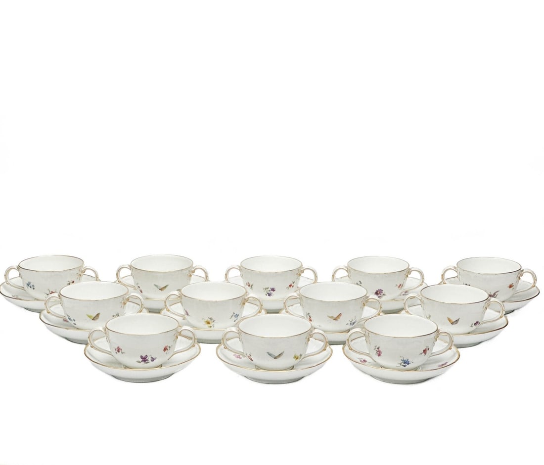11 KPM Berlin German Hand Painted Porcelain Bouillon Bowls & Underplates c. 1900: 11 KPM Berlin German hand painted porcelain bouillon bowls & underside, circa 1900. A white ground, various colorful hand painted flowers and insects. Gilt to the scalloped rims. Underside with KPM ma