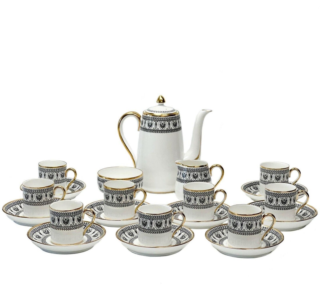 Crown Staffordshire England Porcelain Demitasse Coffee Set for 9 Black Victoria: Vintage Crown Staffordshire England porcelain demitasse coffee set for 9 in Black Victoria. Set includes coffee pot, creamer, open sugar bowl, and 9 cup & saucers. A white ground with black laurel and