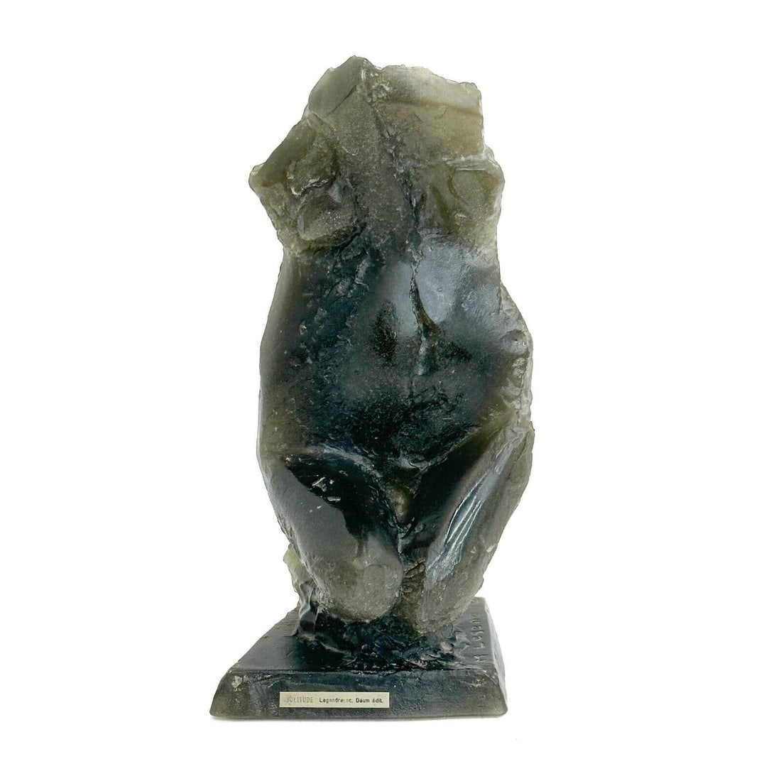 Daum Pate de Verre Sculpture Solitude by Maurice Legendre Signed Ltd Ed/250: Daum Pate de Verre Sculpture Solitude by Maurice Legendre. Dark green pate-de-verre glass, abstracted figure. Artist signed to the lower edge, back marked Daum. Panel to the base marked Solitude Legen