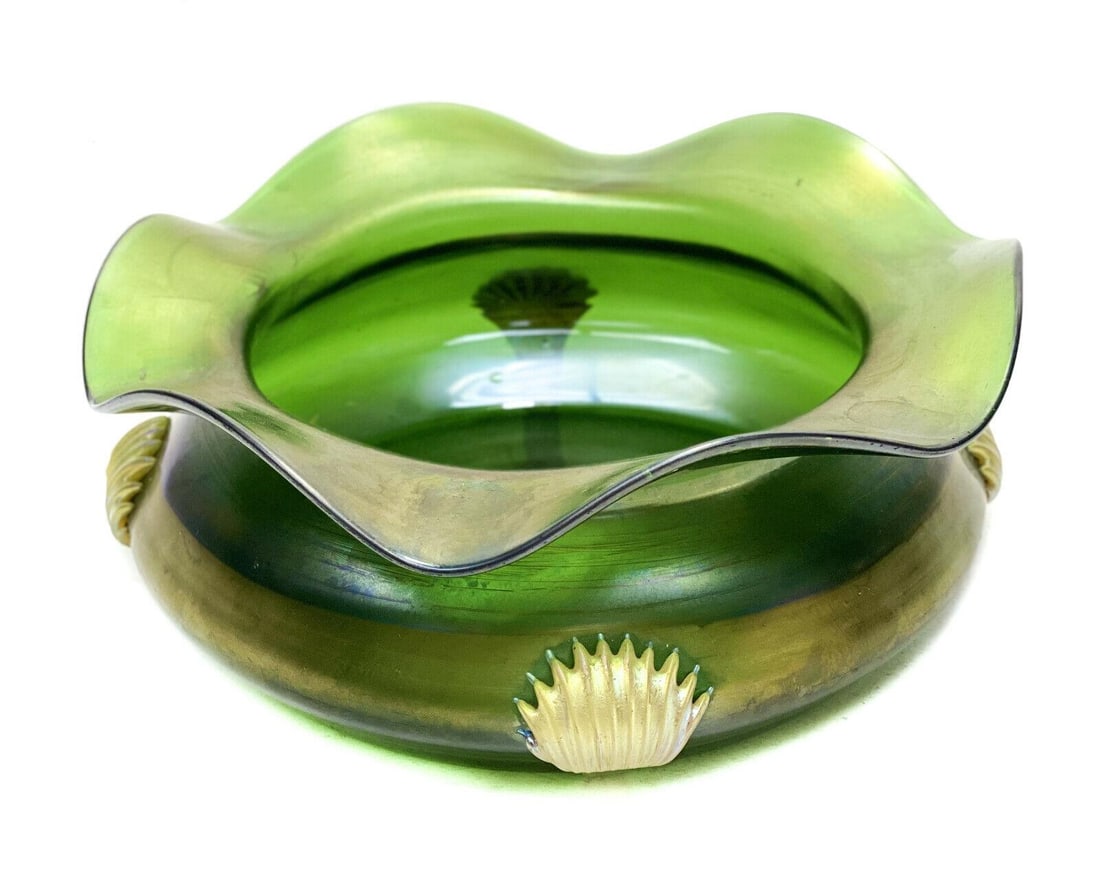 Green Iridescent Art Glass Bowl w Applied Tendrils: A fine green Iridescent art glass rippled bowl, early 20th Century. Applied gold fleck tendrils with pointed ends to the exterior of the bowl. Rippled rim to the bowl. Polished pontil to the underside