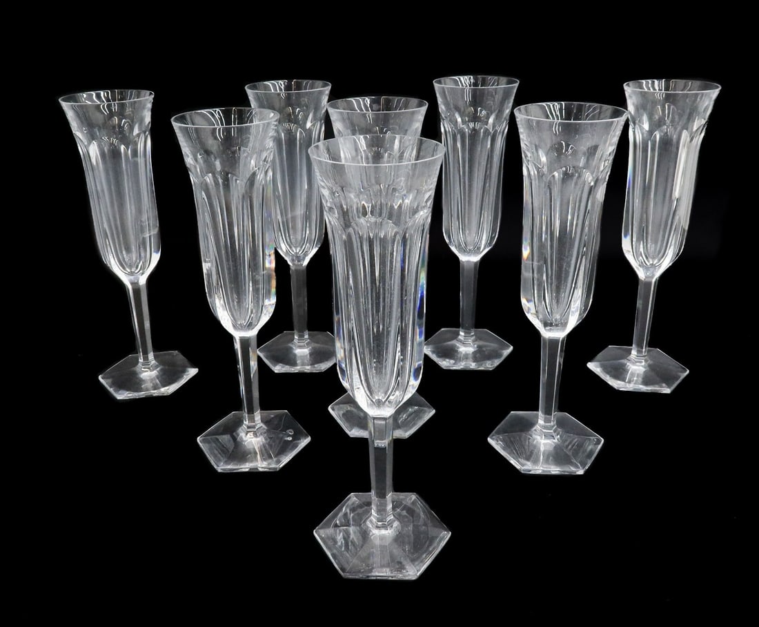 8 Baccarat France Cut Glass Champagne Flutes in Malmaison Signed: 8 Baccarat France cut glass champagne flutes in Malmaison. Cut glass thumbprints to exterior of bowl with hexagonal base. Acid etched Baccarat mark to underside. Weight: Approx. 8 lbs Measurements: Ap
