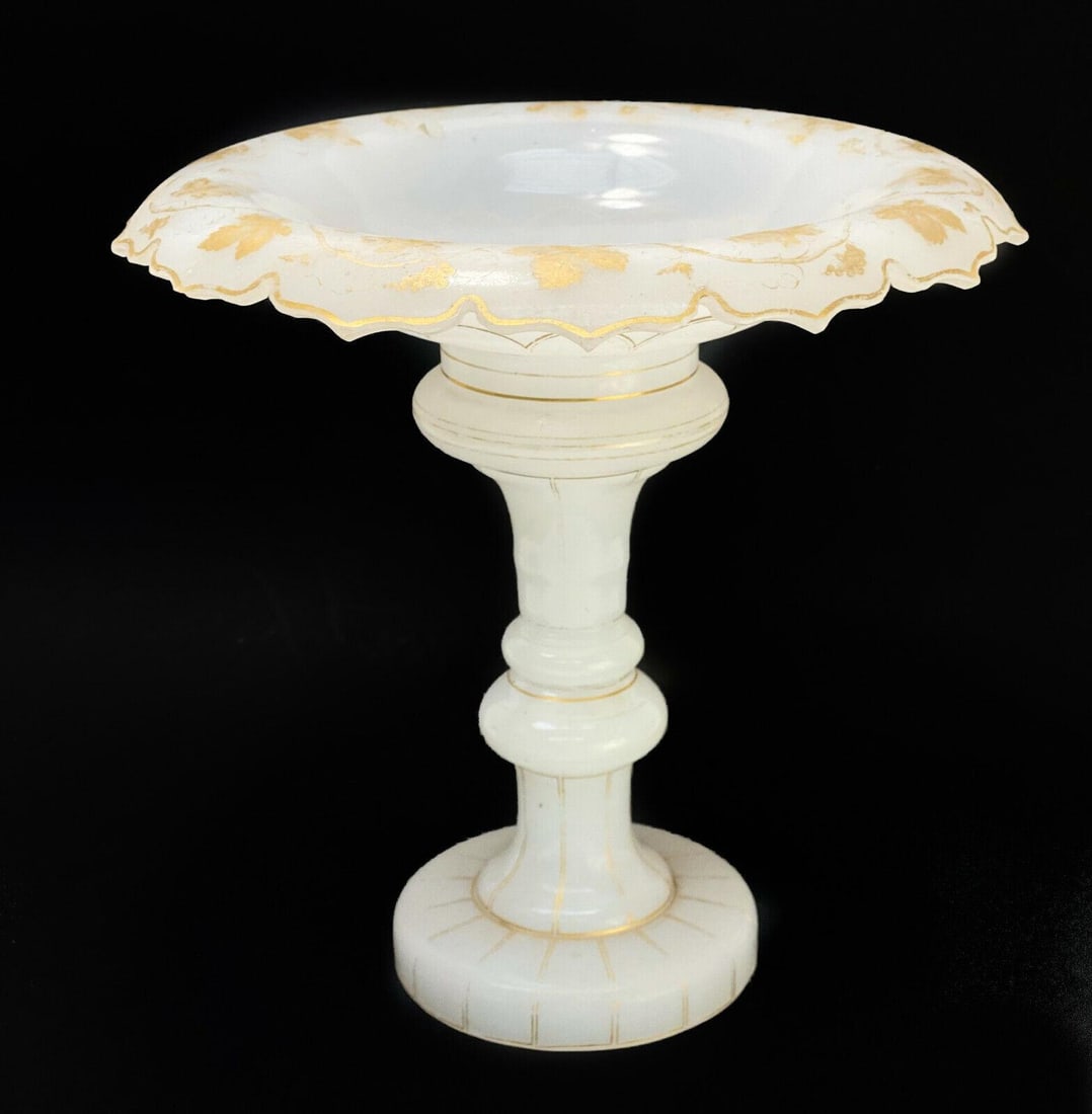 French White Opaline Glass and Gilt Scallop Rimmed Footed Tazza, circa 1920: French White Opaline glass and gilt scallop rimmed footed tazza, circa 1920. Gilt leaf accents around the edge. The bowl of the tazza can be removed. Weight: Approx.2 lbs Measurements: approx. 11 inch