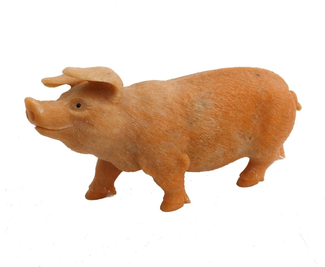 Emil Brecker Eosite Pink Orange Quartz and Onyx Carved Pig Sculpture for Asprey: Emil Brecker for Asprey Eosite Pink Orange Quartz and Onyx Carved Pig Sculpture. The scultpure depicts a carved Eosite adult pig with onyx beaded eyes. Signed "Asprey" to back foot with artist cypher 
