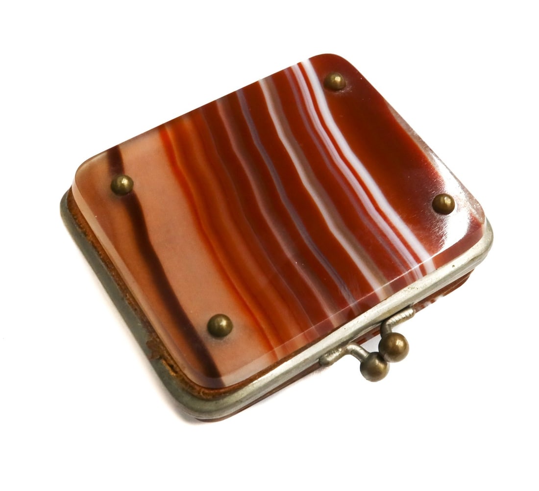 Silvered Metal Banded Agate Coin Purse Early 20th Century: Silvered metal banded agate coin purse, Early 20th Century. Multi-colored orange agate stone to top and base lid. Brown fabric interior. Weight: Approx. 0.5 lbs Measurements: Approx. 2.5 inches x 2.5 