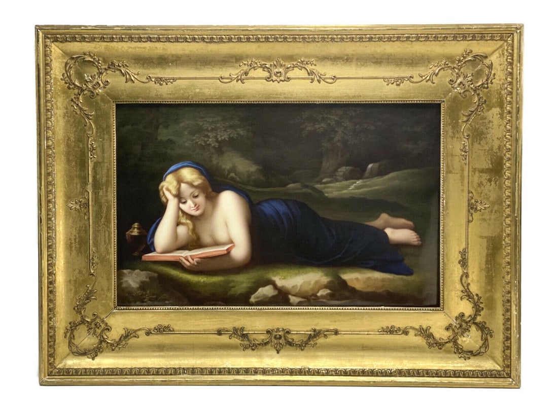 KPM Porcelain Plaque Mary Magdalene Reading: KPM porcelain plaque of Mary Magdalene Reading after Antonio Corregio, 19th Century. The plaque depicts Mary Magdalene in blue velvet garbs reading a book while laying flat on a stone surface in a for