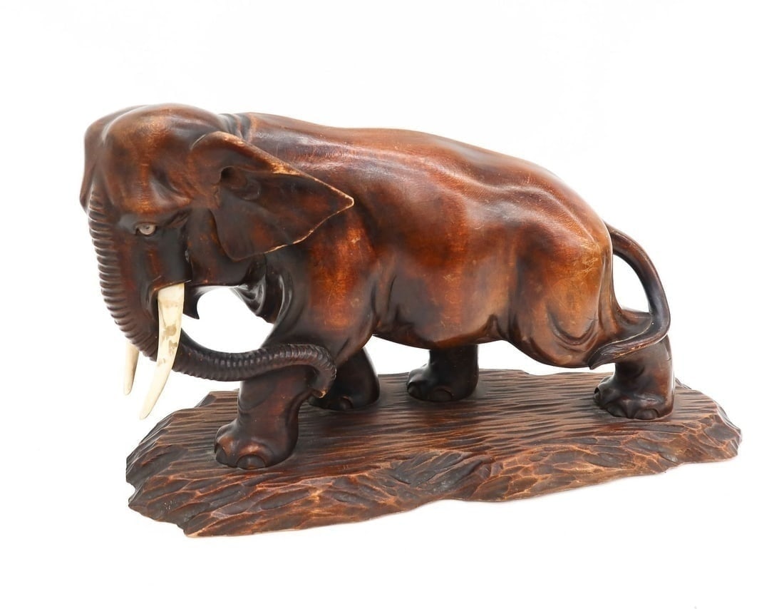 Japanese Wooden Elephant Figure Sculpture.: Japanese Carved Wood sculpture of an Elephant figure with tusks. Early 20th Century, probably Meiji period. Weight Approx., 2 lbs Measures Approx., 15.5 inches x 6 inches x 8.5 inches tall Domestic Sh