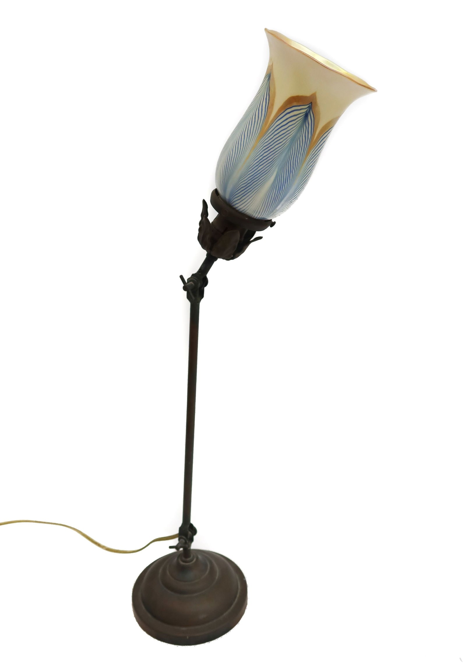 Steuben Glass and Bronze Lamp: Steuben Glass and Bronze Lamp. Bronze stem with feathered leaves to stueben glass. Steuben mark with Fleur dis Lis to edge of inner mouth of shade. Circa 1920. Weight Approx., 2 lbs Measures Approx., 