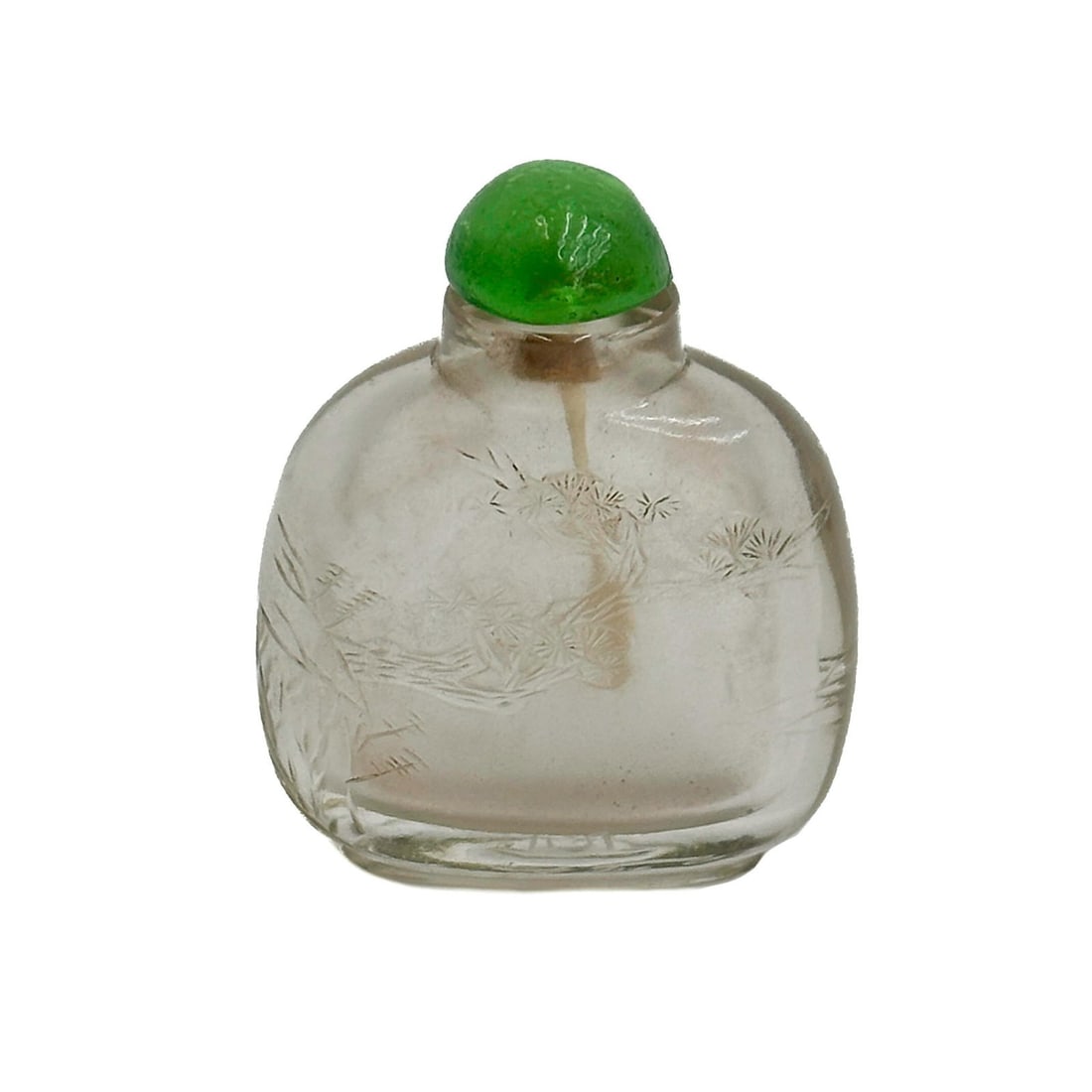 Chinese Carved Clear Rock Crystal Bottle circa 1850: Chinese Carved Clear Rock Crystal Bottle, circa 1850. Carved pine trees to sides, clear green glass stopper Weight Approx., 42g Measures Approx., 1.75 inches x .75 inch x 2.125 inches tall Domestic Sh