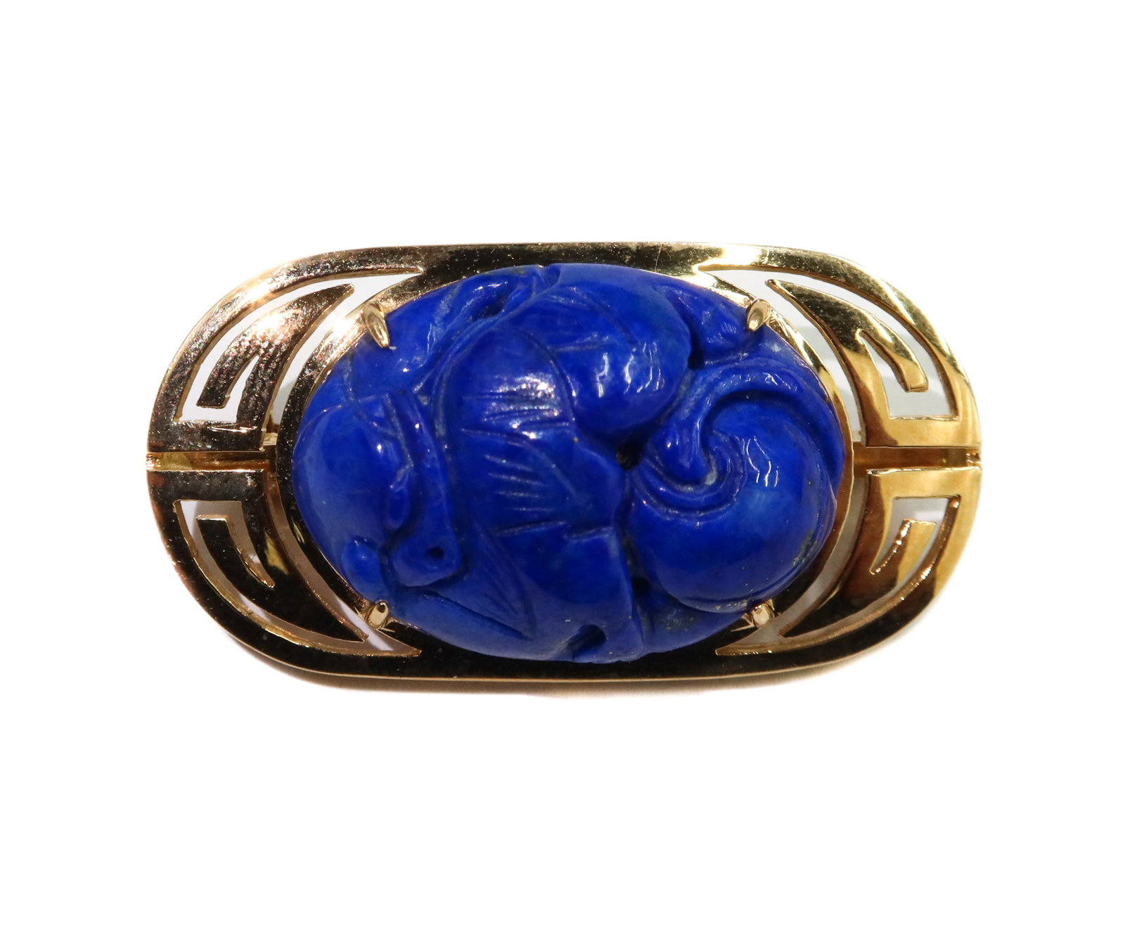 Gump's 14k Yellow Gold and Carved Lapis Lazuli Pendant Brooch: Gump's 14k Yellow Gold and Carved Lapis Lazuli Pendant Brooch. Etched scarab to center measuring 24.8mm x 17.93mm x 7.17mm. Marked Gump's 14k to back. Weight Approx., 11.62 grams Measures Approx., 0.7