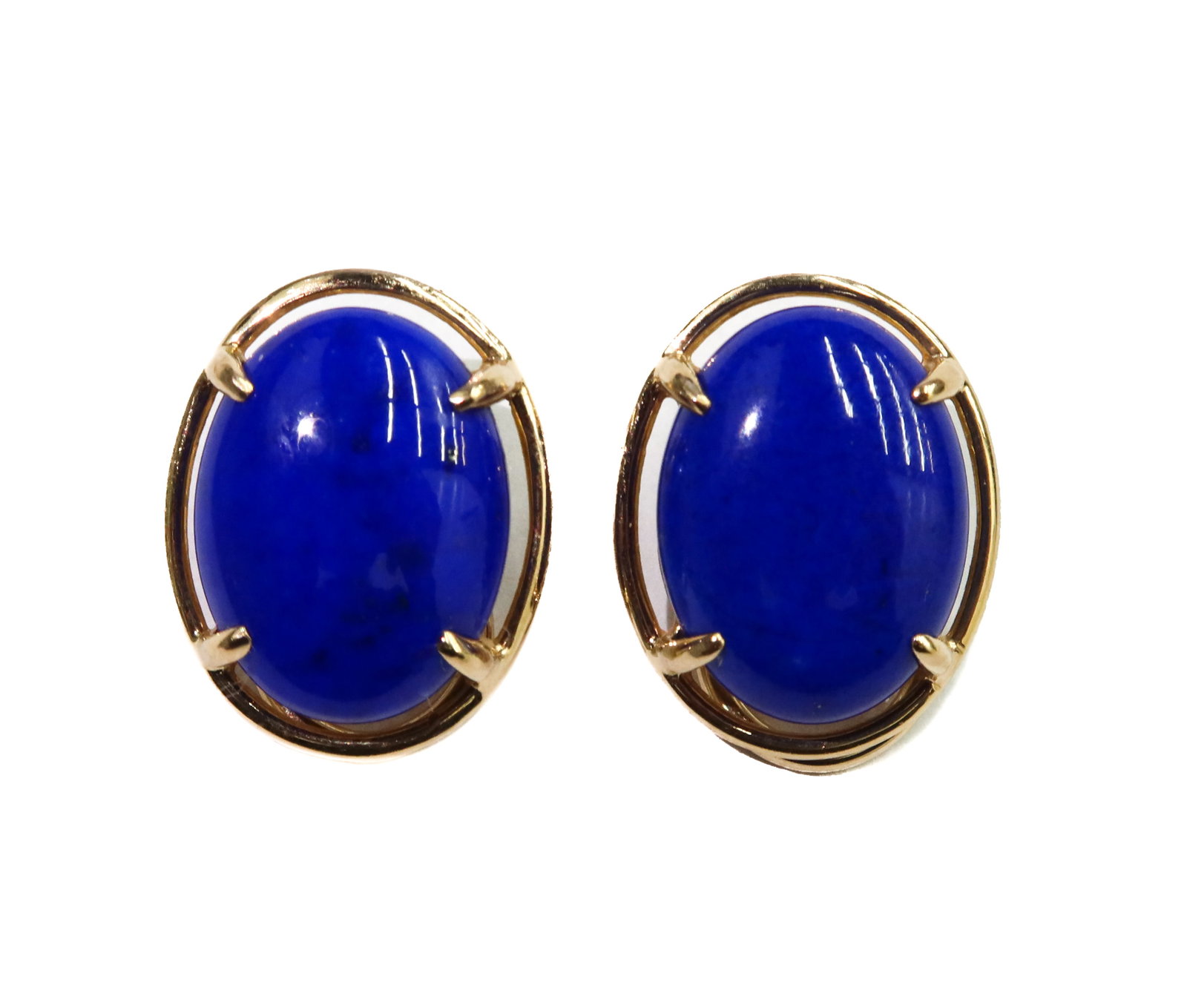 Gump's 14k Yellow Gold and Cabochon Lapis Lazuli Clip Earrings: Gump's 14k Yellow Gold and Cabochon Lapis Lazuli Clip Earrings. Cabcochon lapis lazuli measuring approximately 16.15mm x 12.03mm x 5mm. Marked Gumps 14k. Weight Appox., 7.9 grams Measures Approx., 0.7