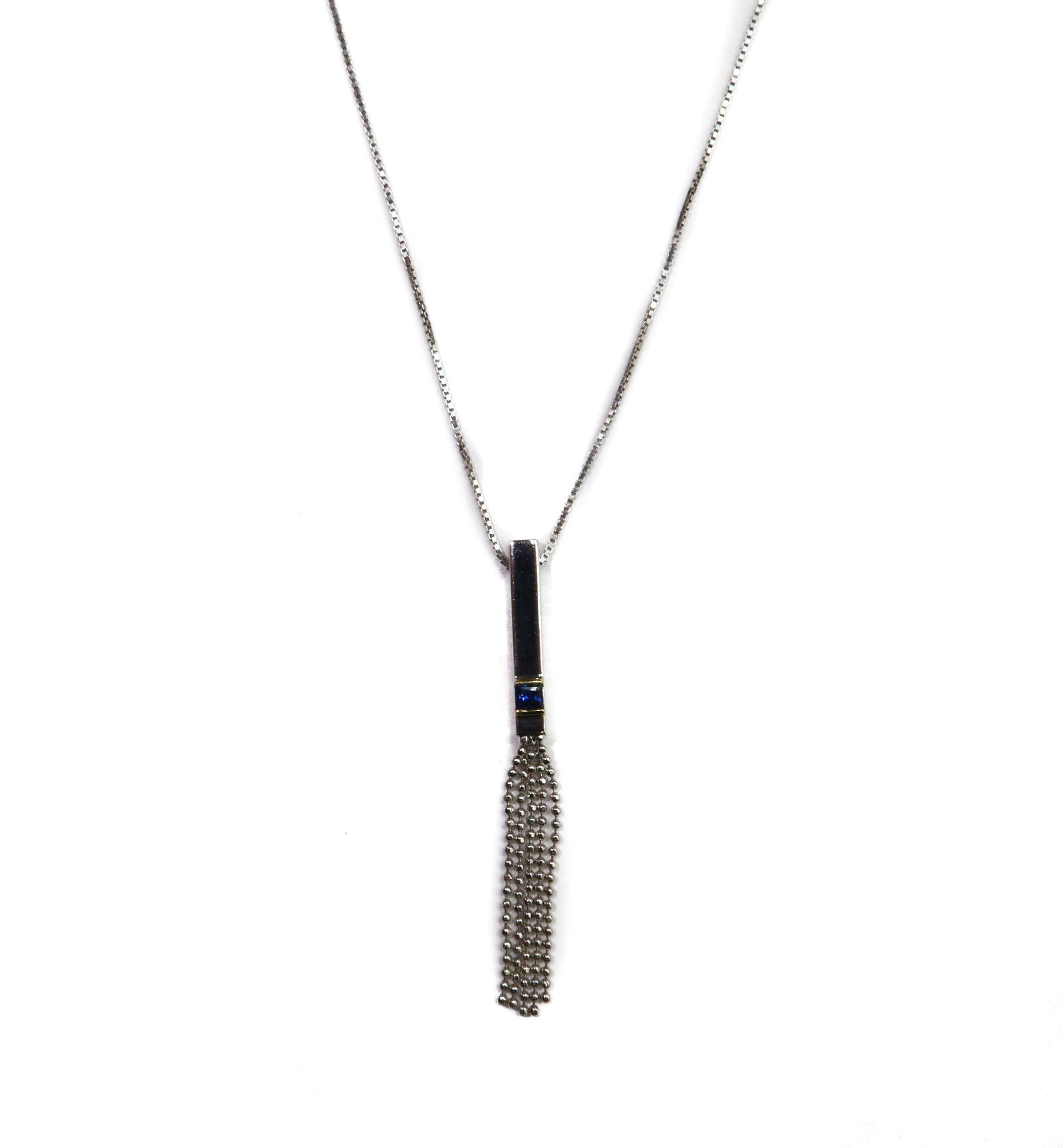 Italian 18k White Gold and Sapphire Box Chain Necklace: Italian 18k White Gold and Sapphire Box Chain Necklace. The pendant with a square cut sapphire and beaded tassles to the end. Italian 18k gold marks to clasp with Arezzo maker mark "1287 AR" Weight Ap