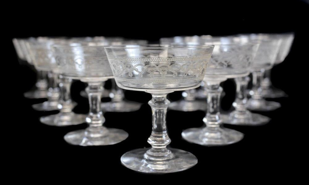 13 Continental Glass & Etched Acid Sherbet Compotes: 13 Continental engraved glass sherbets or compotes., Circa 1940. Weight approx., 5 lbs. Approximately, height 3.75 inches diameter x height 4 inches Domestic Shipping: $60