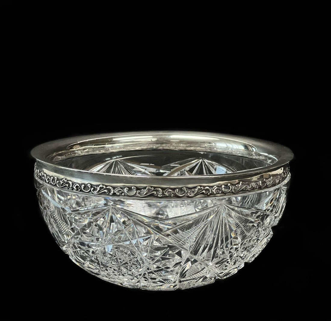 Stone Sterling Co. Sterling Silver & Cut Glass Centerpiece Bowl, circa 1900: Stone Sterling Silver Co. cut glass bowl with sterling silver rim, circa 1900. Diamond and fan design cut glass, foliate design to sterling rim. Marked Sterling to the side with Stone mark. Weight: Ap