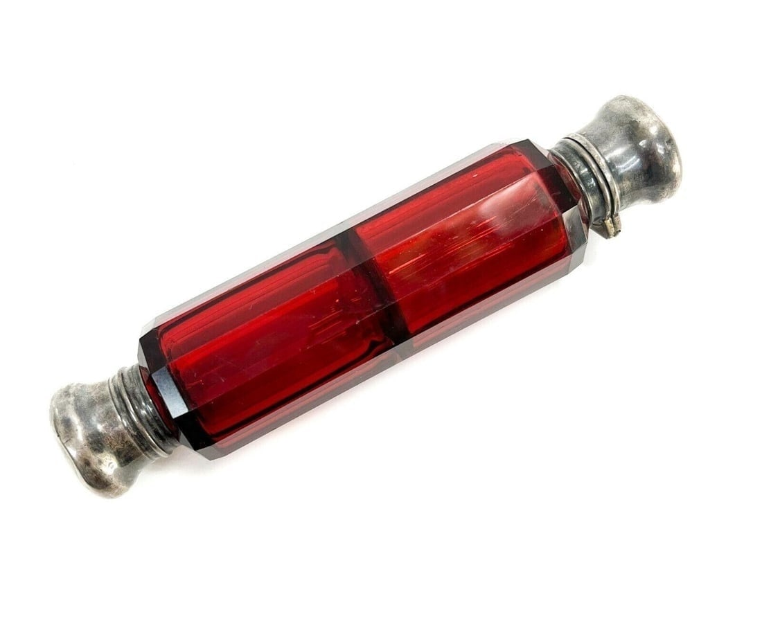 Continental Cranberry Red Glass and Silver Dual Compartment Vanity Bottle c1900: Continental cranberry red glass and silver dual compartment vanity bottle, circa 1900. London retail marks to the one side of the stoppers. Apparently unmarked, but tests for silver. Weight Approx., 0