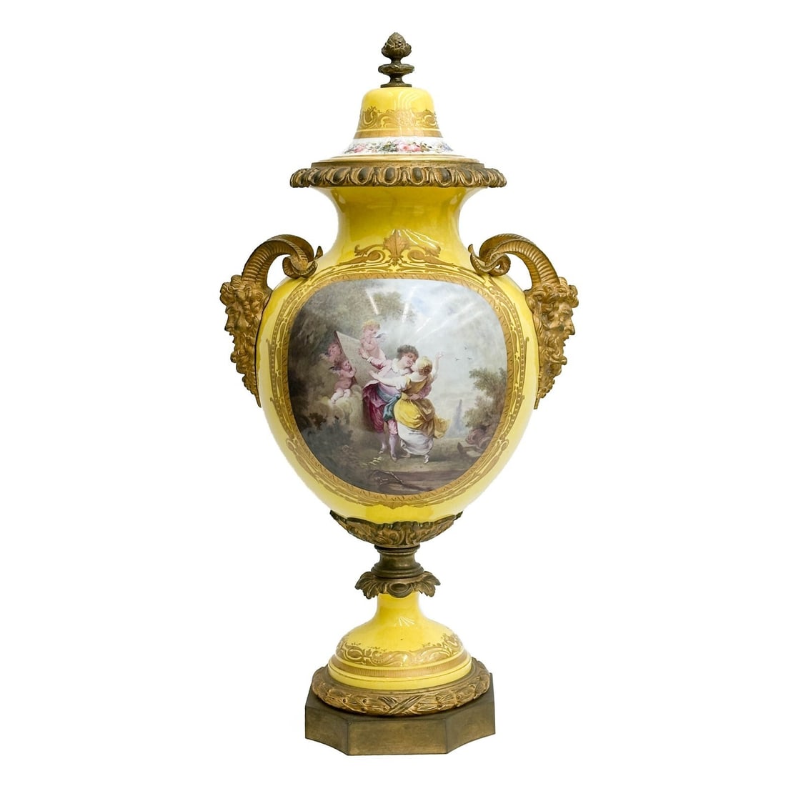 Sevres France Hand Painted Porcelain Bronze Mounted Large Covered Urn: Sevres France hand painted porcelain bronze mounted large covered urn, circa 1900. A yellow ground with hand painted scene of figures and cherubs to one side, artist signed to the lower edge, florals 