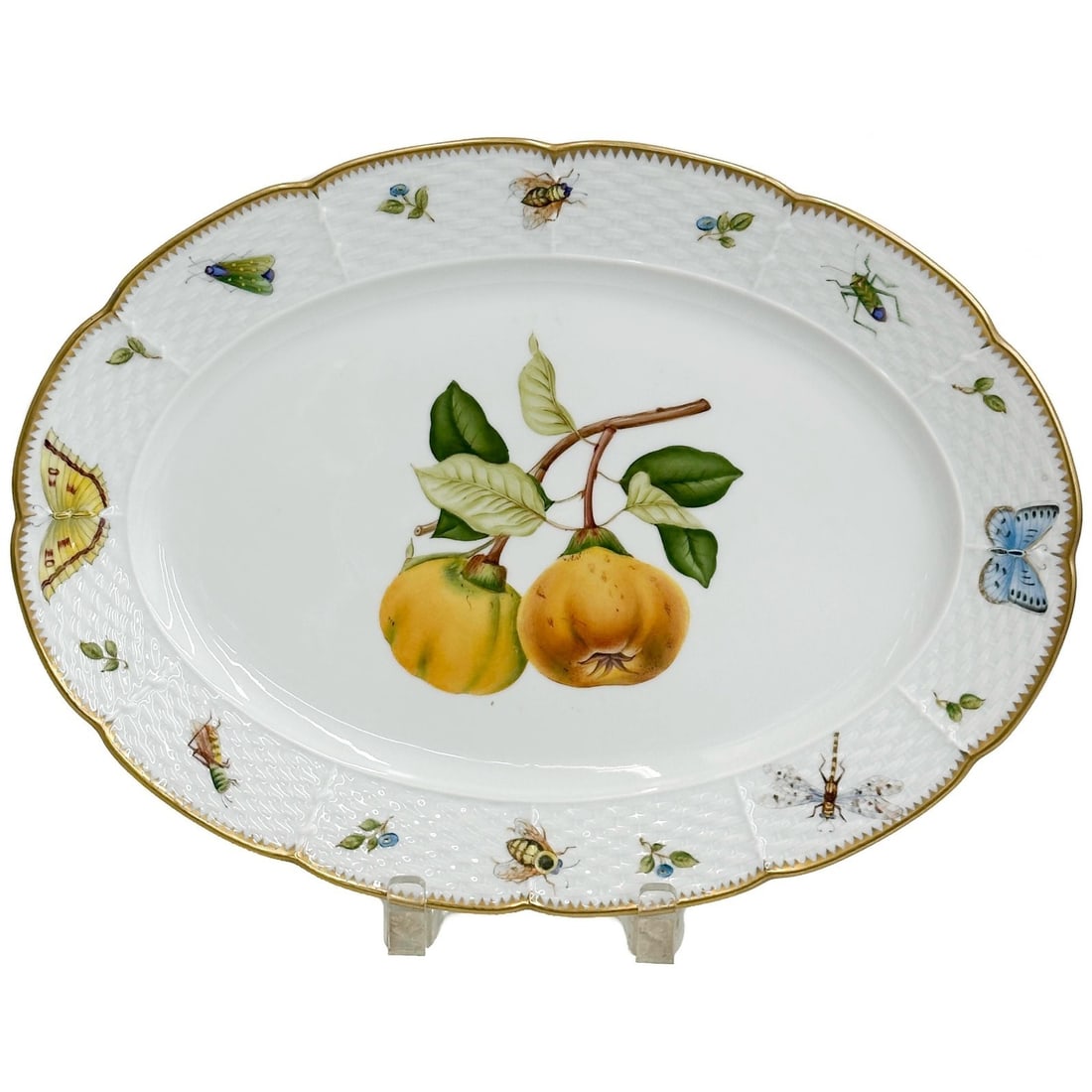 Anna Weatherley Hungary Porcelain Platter Giftware Pattern Quince Fruits: Anna Weatherley Hungary Hand Painted Porcelain Oval Platter in the Giftware Pattern Quince. A white ground with molded decoration, hand painted orange fruits with insects, gilt accents. Underside mark