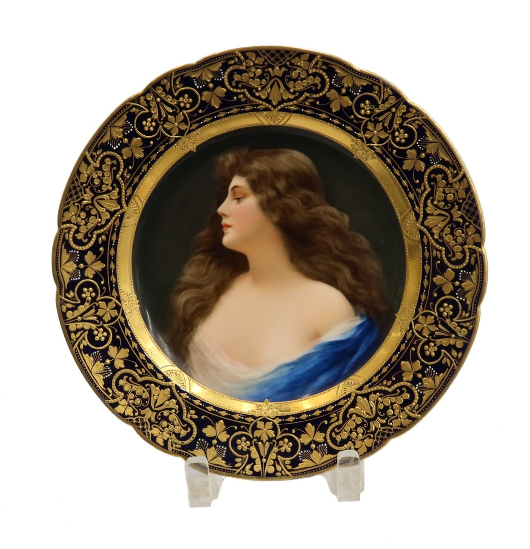 Royal Vienna Hand Painted Portrait Plate Erbluth Signed Wagner circa 1900: Royal Vienna hand painted portrait plate, Erbluth circa 1900. The portrait depicts a young beauty with brown flowing hair. Artist signed "Wagner" to edge. In a cobalt blue ground with gold encrusted f