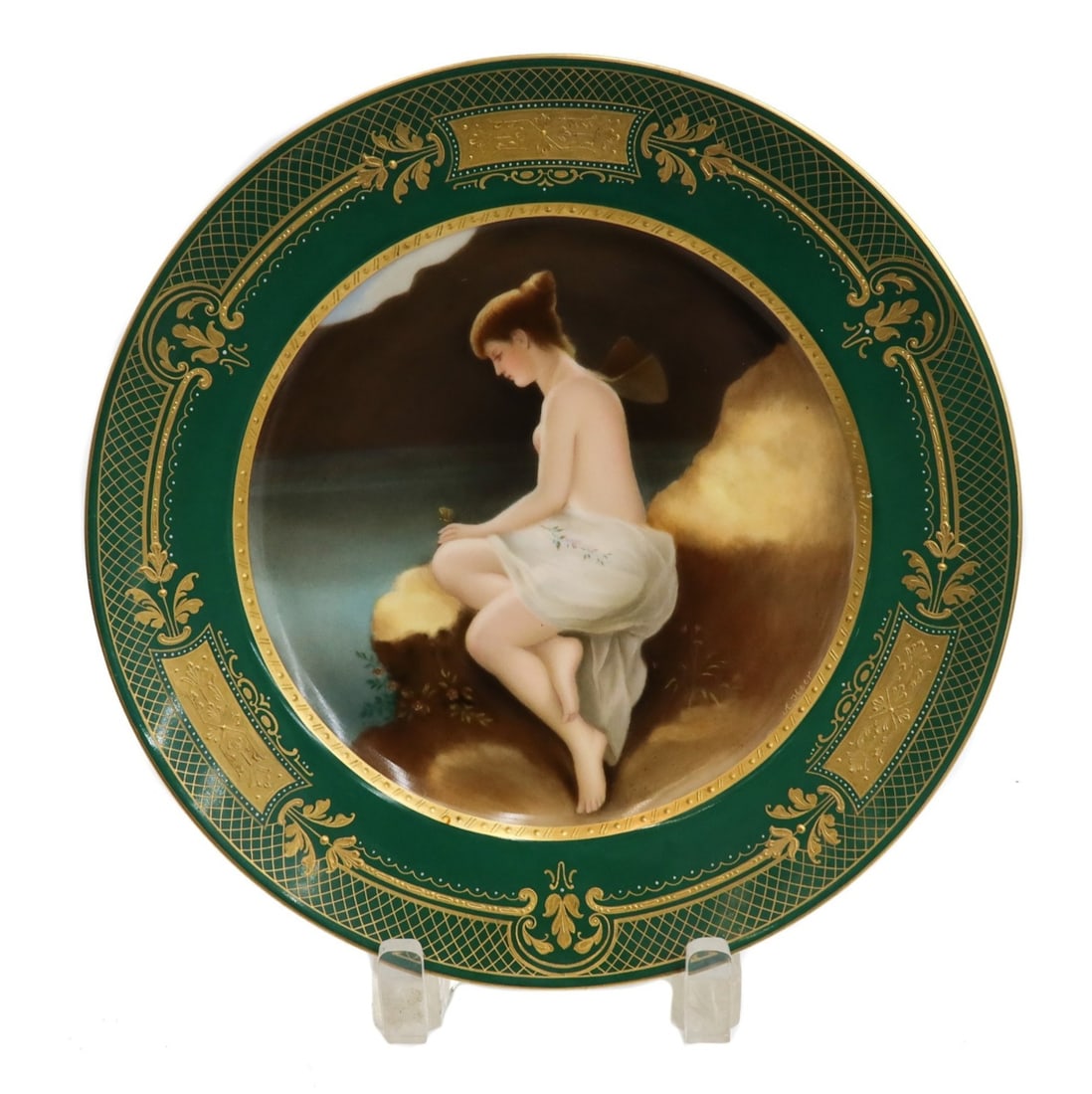 Royal Vienna Hand Painted Portrait Plate Pysche am Meer Signed A.Heer circa 1900: Royal Vienna hand painted portrait plate "Psyche am Meer" circa 1900. The portrait plates depicts a contemplative Pysche sitting on a seaside rock with a yellow butterfly perched on her hand. Artist s