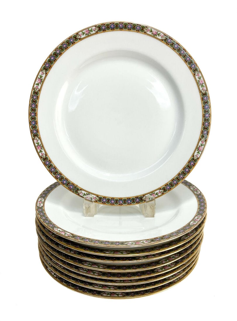9 Jean Pouyat Limoges France Porcelain Dinner Plates, circa 1900: 9 Jean Pouyat Limoges France porcelain dinner plates, circa 1900. Floral designs with geometric shapes to the rim. Marked Jean Pouyat Limoges to the underside. Weight: Approx. 8 lbs Measurements: Appr