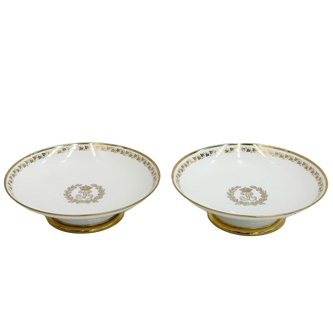 Pair Manufacture de Sevres Porcelain Compotes Chateau Neuilly / Trianon 1840-41: Pair Manufacture de Sevres Gilt Porcelain Compotes. Gilt stylized monogram to the center beneath a crown, ivy leaves to the edge. Underside marked for Chateau des Neuilly and Chateau de Trianon, Sevre