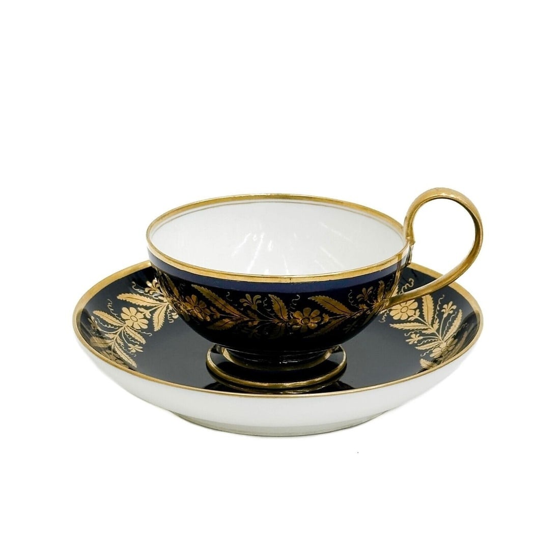 Manufacture de Sevres Cup & Saucer Ch Tuileries Tasse The Coupe et Soucoupe 1844: Manufacture de Sevres Porcelain Cup & Saucer Chateau des Tuileries Tasse a Thé Coupe et Soucoupe 1844. A cobalt blue ground decorated with gilt florals. Underside with Sevres marks, Chateau des Tuile