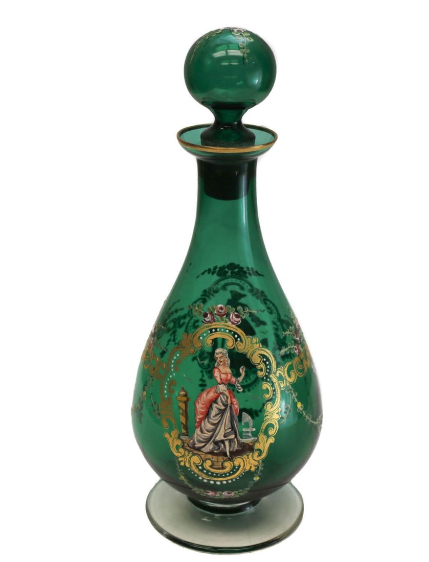 Bohemian Green Art Glass and Hand Painted Enamel Bottle, circa 1920: Bohemian green art glass hand painted enamel bottle, circa 1920. Charming hand painted enamel period era figures to the exterior. Gilt foliate scrolls throughout. Weight: Approx. 1 lb Measurements: Ap