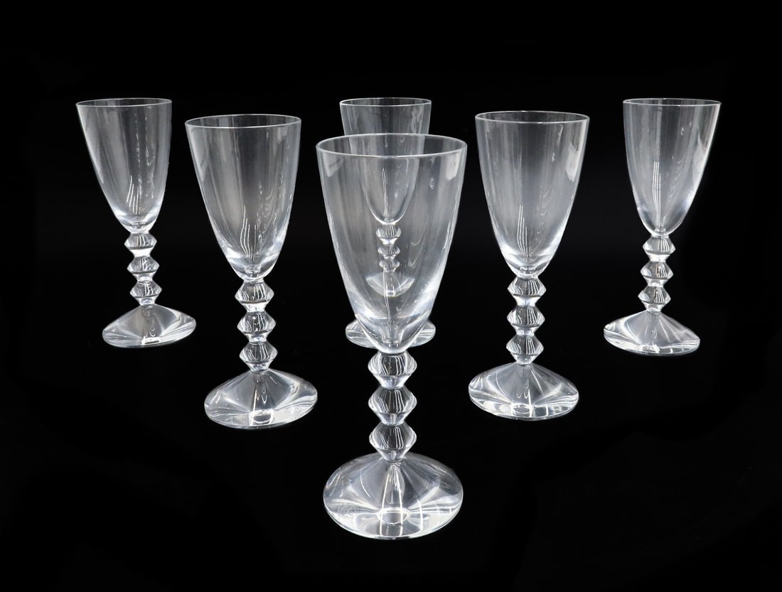 6 Baccarat France Crystal Glass Port Wine Goblets in Vega: 6 Baccarat France crystal glass port wine goblets in Vega. 3 stacked geometric diamond beads to stem. Baccarat mark to base with acid etched Baccarat mark to underside. Weight: Approx. 6 lbs Measureme