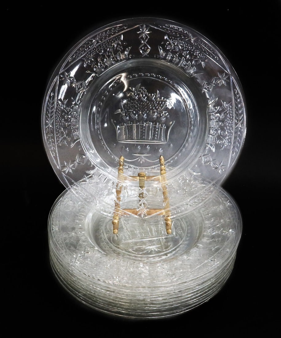 10 English Cut Glass Emulating Rock Crystal 8.75 inch Plates Early 20 Century: 10 English cut glass emulating rock crystal 8.75 inch plates, Early 20 Century. Engraved fruit baskets, and star designs throughout. Weight: Approx. 4 lb Measurements: Approx. 8.75 inches diameter Dom