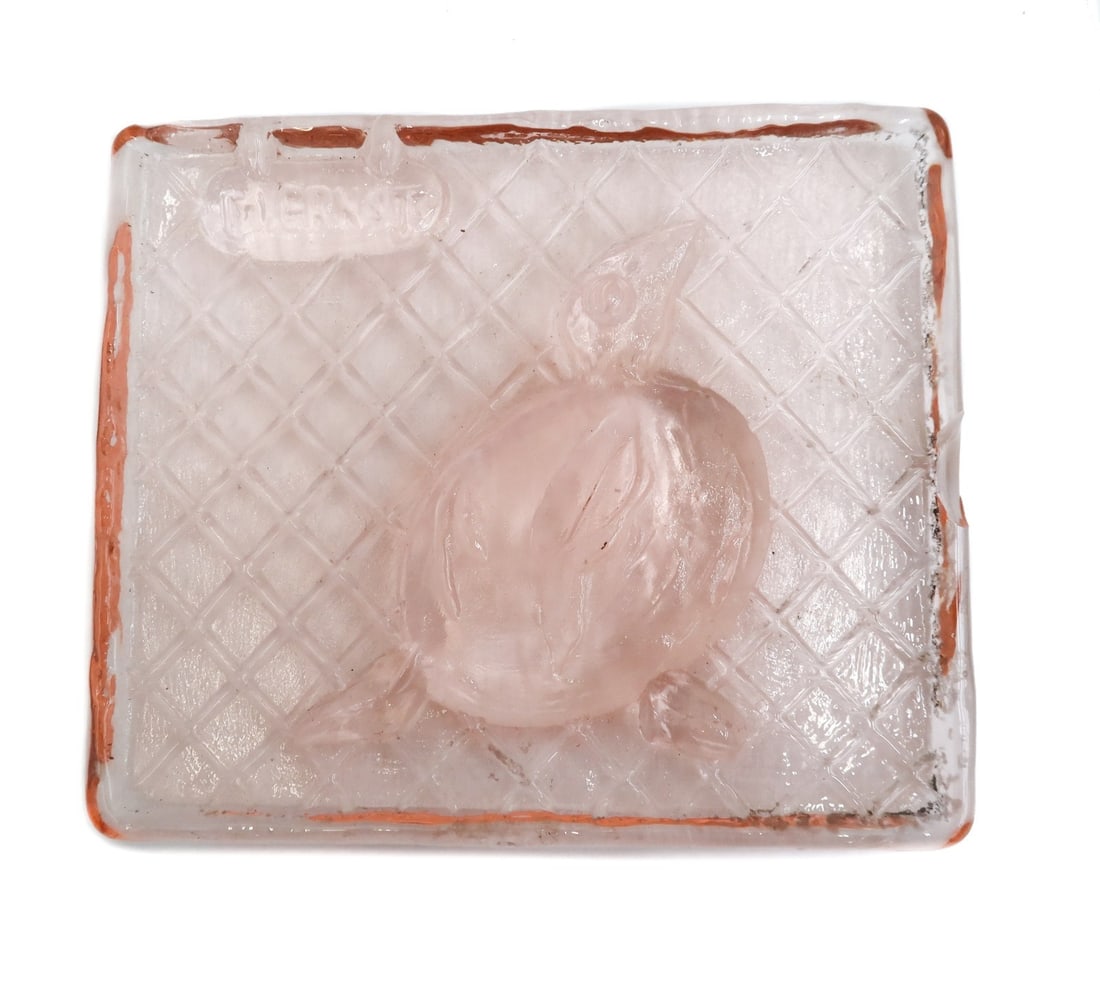 Max Ernst (1891-1976) for Fucina degli Angeli Pink Cast Art Glass Tile Bird: Max Ernst (1891-1976) for Fucina degli Angeli Pink Cast Art Glass Tile. Depicts a bird, raised M Ernst to the edge. Weight: Approx. 3 lbs Measurements: Approx. 7.75 inches x 6.625 inches x .75 inch Co