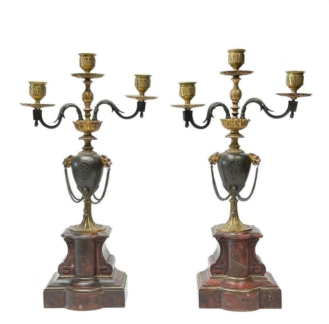 Pair Henri Picard French Rouge Marble Gilt & Patinated Bronze Candelabras 19th c: Pair Henri Picard French rouge marble, gilt and patinated bronze candelabras, 19th century. Red marble bases, bronze stem with a medallion of low relief putti to either side, lion's heads holding chai