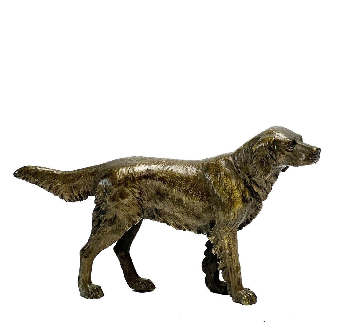 Patinated Bronze Figure of a Dog 1st half 20th century: Patinated bronze figure of a dog, 1st half 20th century. Figure depicts a dog walking forward, possibly pointing ahead. Apparently unmarked. Weight: Approx. 2.5 lbs Measurements: Approx. 10 inches x 1