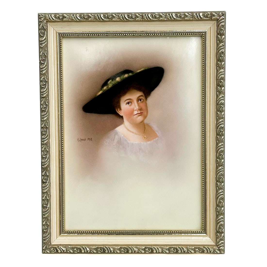 KPM Berlin Hand Painted Porcelain Portrait Plaque Signed H Leas 1912 Framed: KPM Berlin hand painted porcelain portrait plaque. Depicts a portrait of a woman with a hat. Artist signed to lower edge of portrait "H leas 1912". Mounted in a wood frame. Weight: Approx. 2.5 lbs Mea