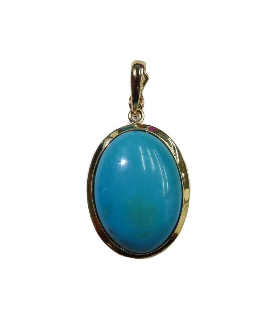 14k Yellow Gold and Oval Turquoise Pendant: 14k Yellow Gold and Oval Turquoise Pendant. Oval cabochon turquoise to center measuring approximately 18.6mm x 13mm x 4.9mm. Marked 14k to hook. Weight Approx., 2.4 grams Measures Approx., 1.25 inches